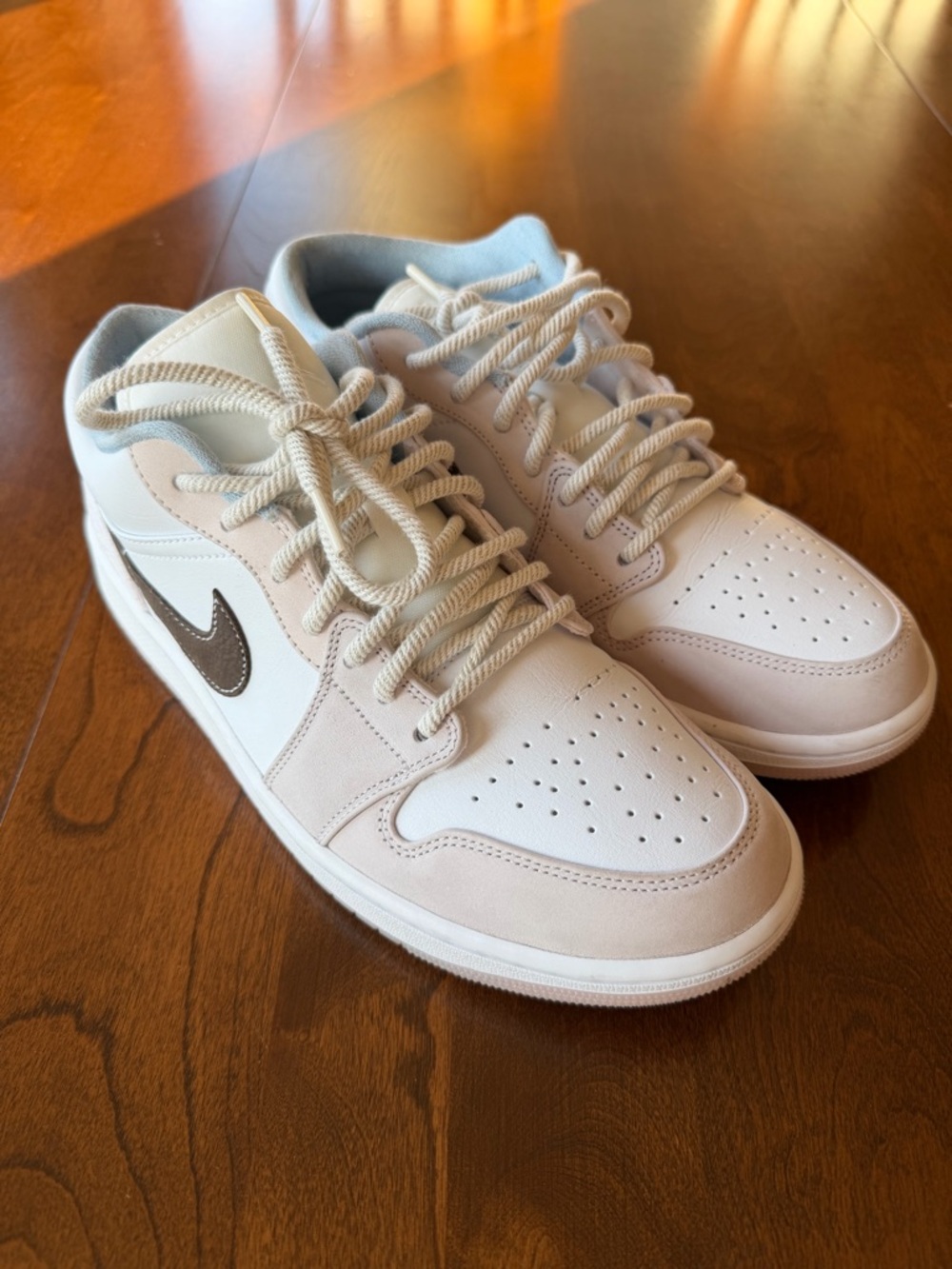 Nike Air Jordan 1 low-women’s .  White, light soft pink and ironstone.